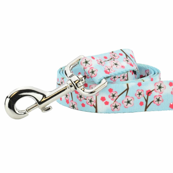 Close-up of dog leash with cherry blossom print on light blue background by Primemarket7 - Earthstyle - Earthstyle