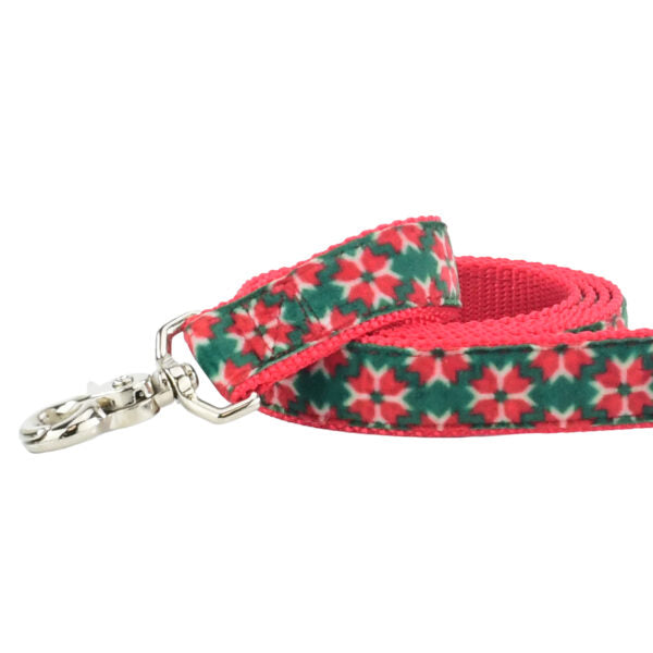 Close-up of poinsettia velvet dog leash with silver hardware by Primemarket7