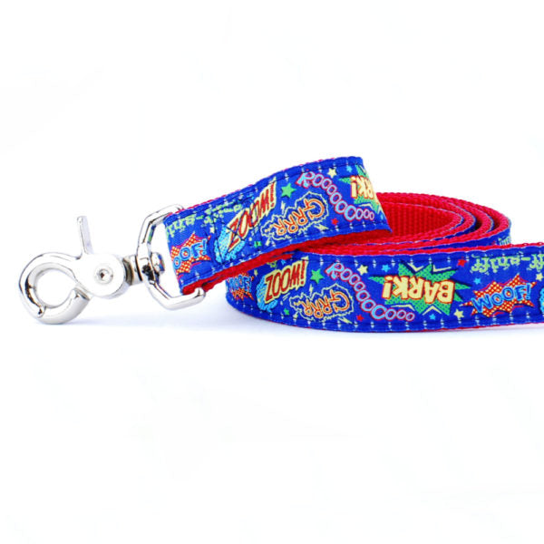 Close-up of comic book style dog leash with red webbing and blue ribbon featuring 'Bark!' and 'Zoom!' text by Primemarket7